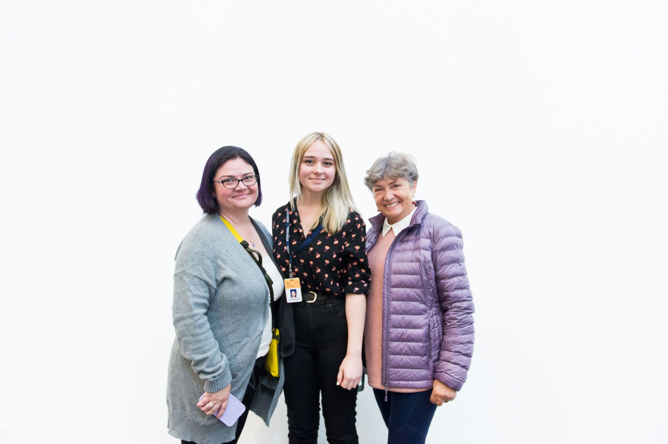 Teen Art Connect intern and <em>What We Hold</em> participant Téa Kaplan with her mother and grandmother at the opening reception.